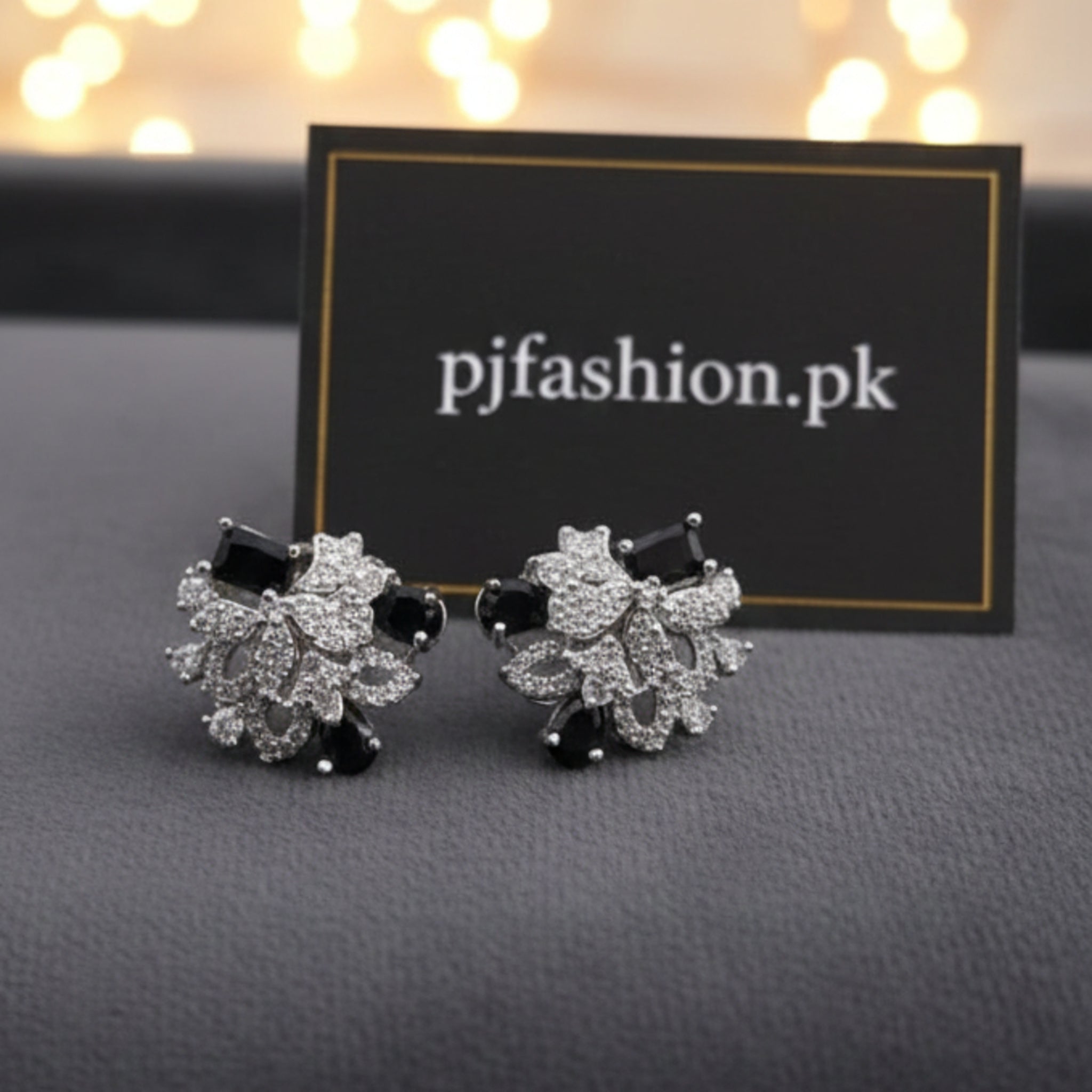 Leaf-Motif Zirconia Earrings with Vibrant Emerald (FSE215)