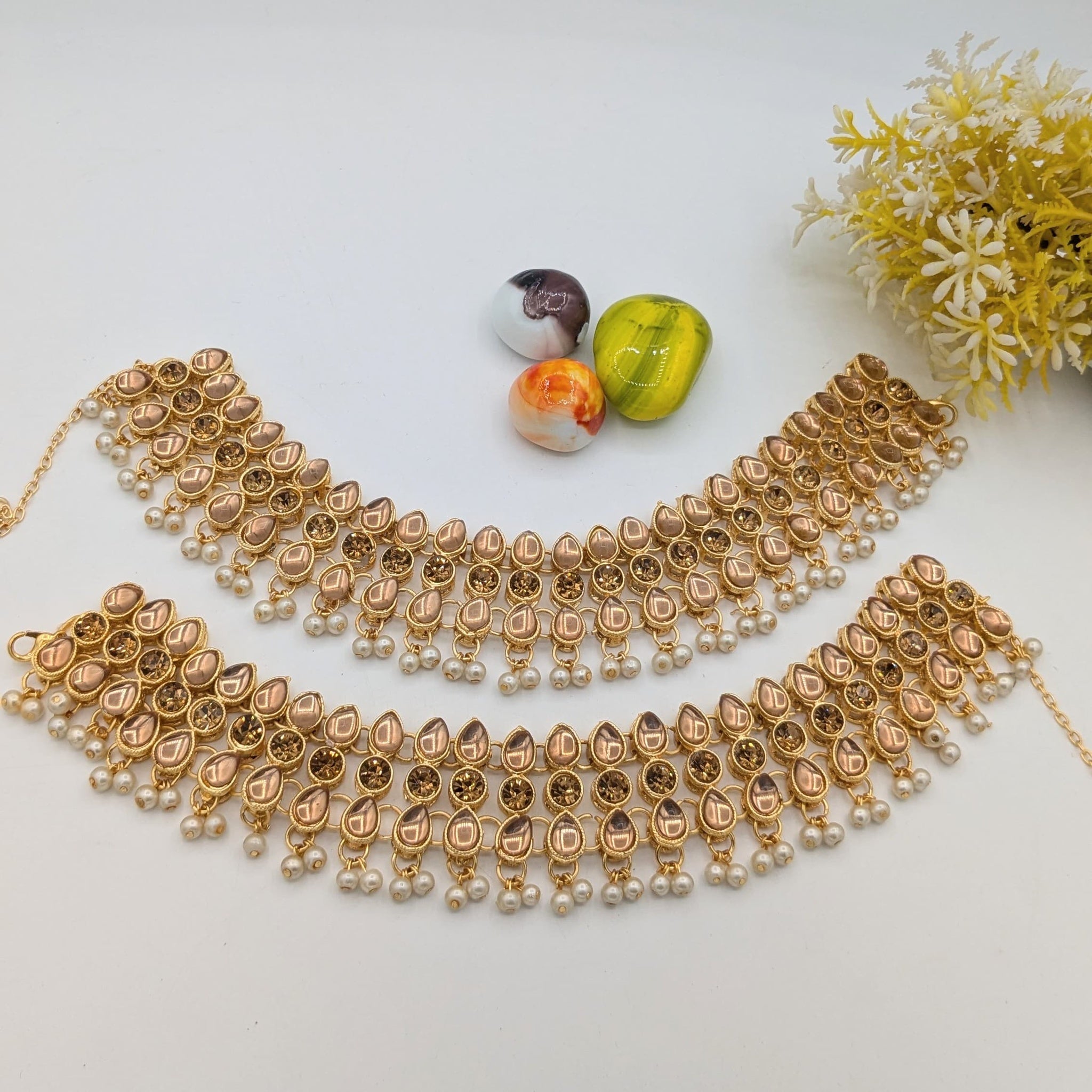 Anclet Pair Stone Work